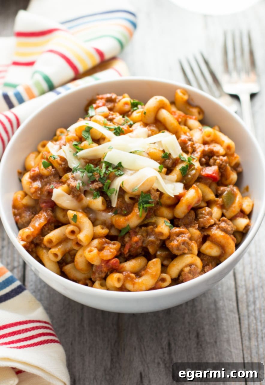 One Pot Chili Mac | Tender beef, gooey cheese, and pasta in one easy weeknight dish.