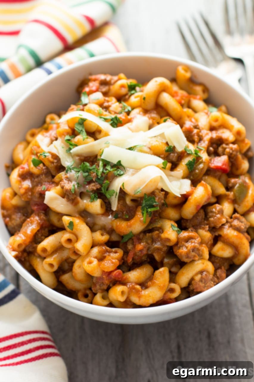 One Pot Chili Mac | Tender beef, gooey cheese, and pasta in one easy weeknight dish.