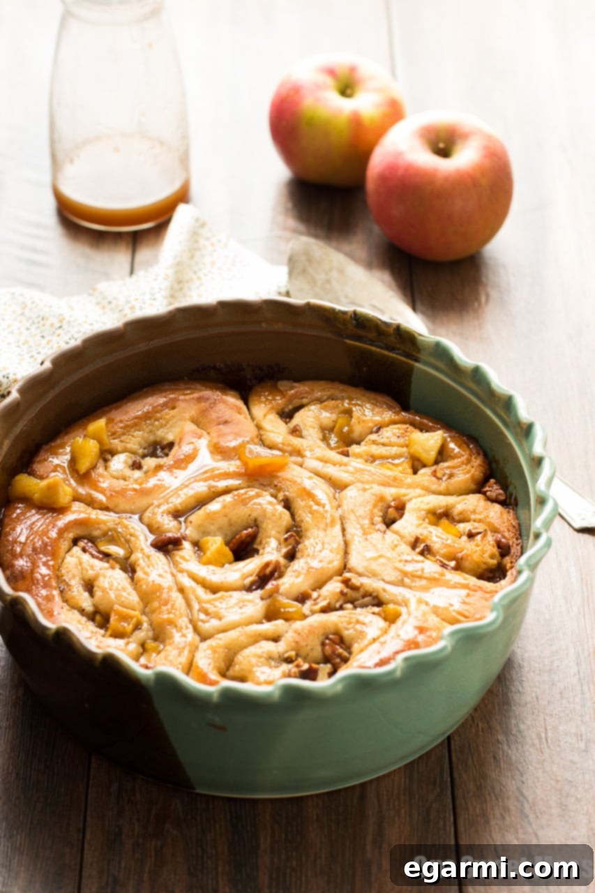 Gooey Caramel Apple Cinnamon Swirls 2 Buttery Caramel Apple Cinnamon Rolls with a luscious caramel glaze