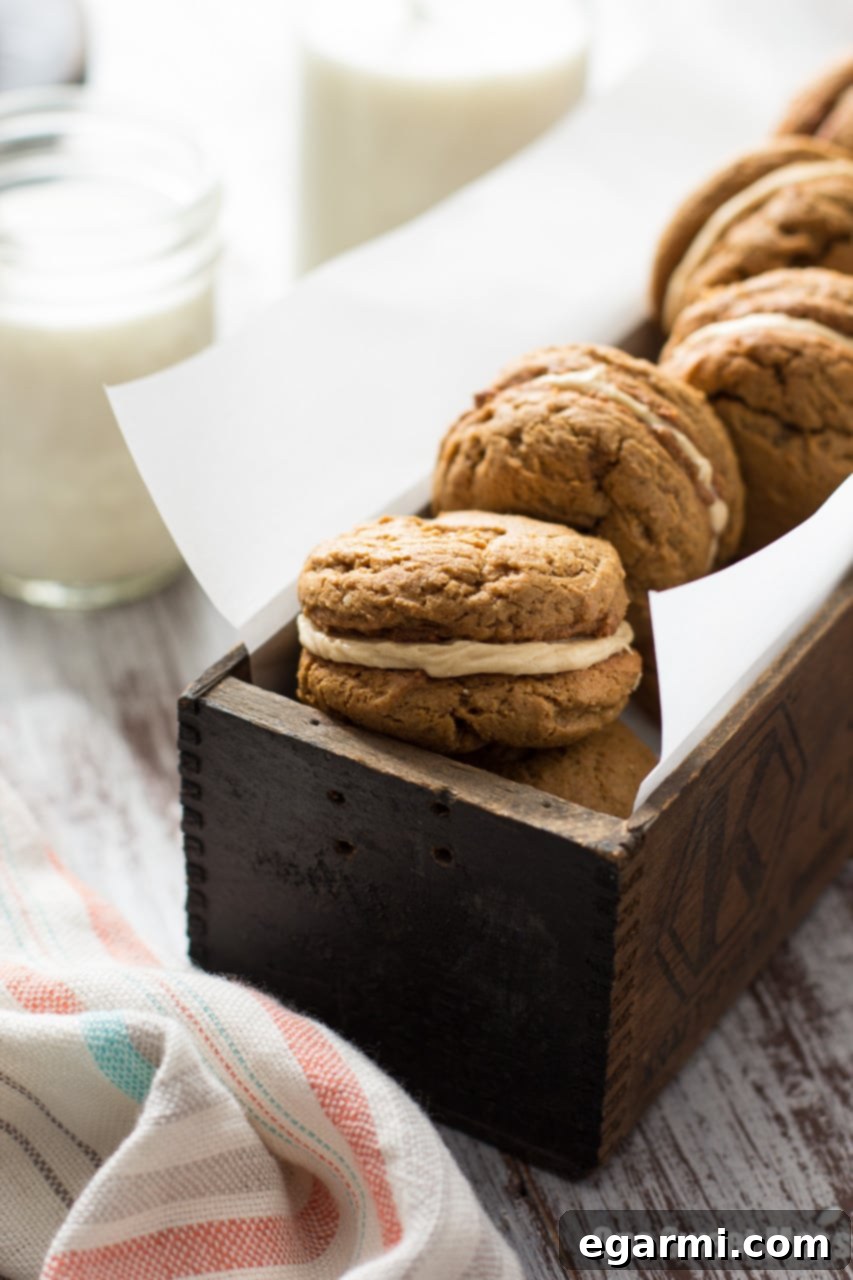A close-up view of the creamy Pumpkin Cookie Butter Buttercream filling