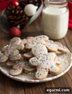 Final plated Glazed Gingerbread Men with colorful sprinkles.