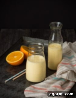 Final Dreamsicle Smoothie in a glass, ready to be enjoyed.