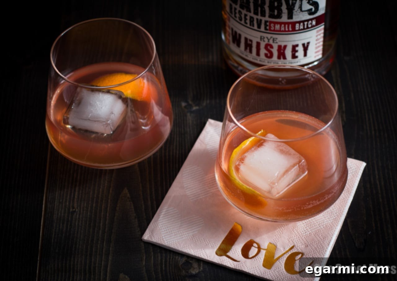 Whispers of a Waltz 3 The Tiny Dancer Cocktail: This fierce but delicate cocktail combines bourbon, Campari, and blood orange juice.