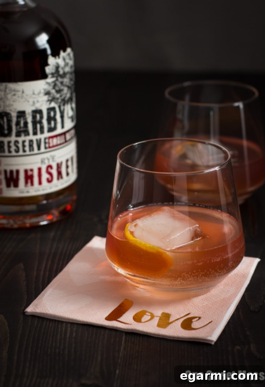 Whispers of a Waltz 5 The Tiny Dancer Cocktail: This fierce but delicate cocktail combines bourbon, Campari, and blood orange juice.